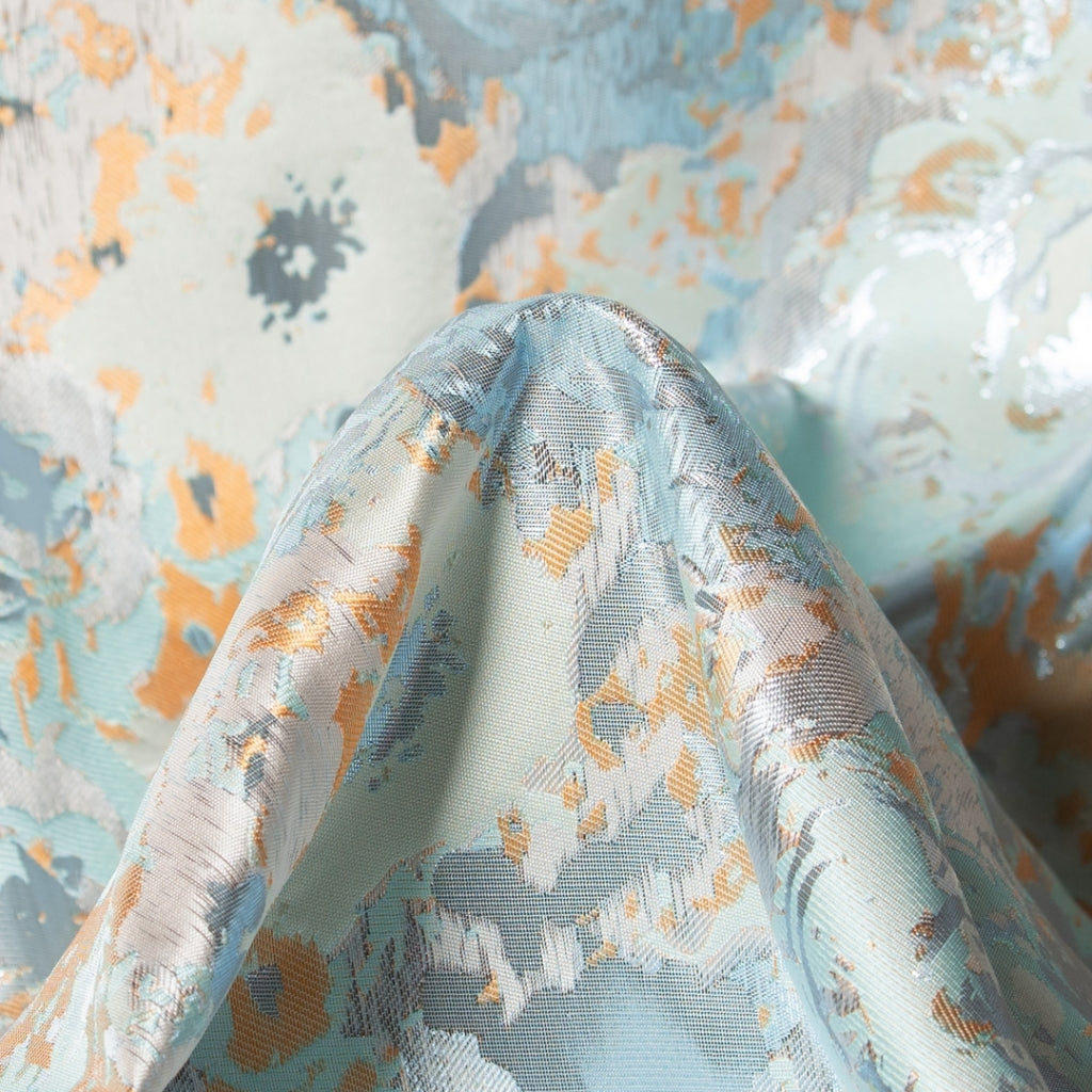 Pude i sart blå, sølv og orange