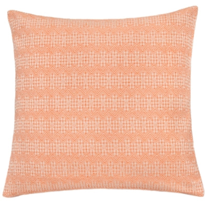 Pude med orange og hvidt grafisk mønster