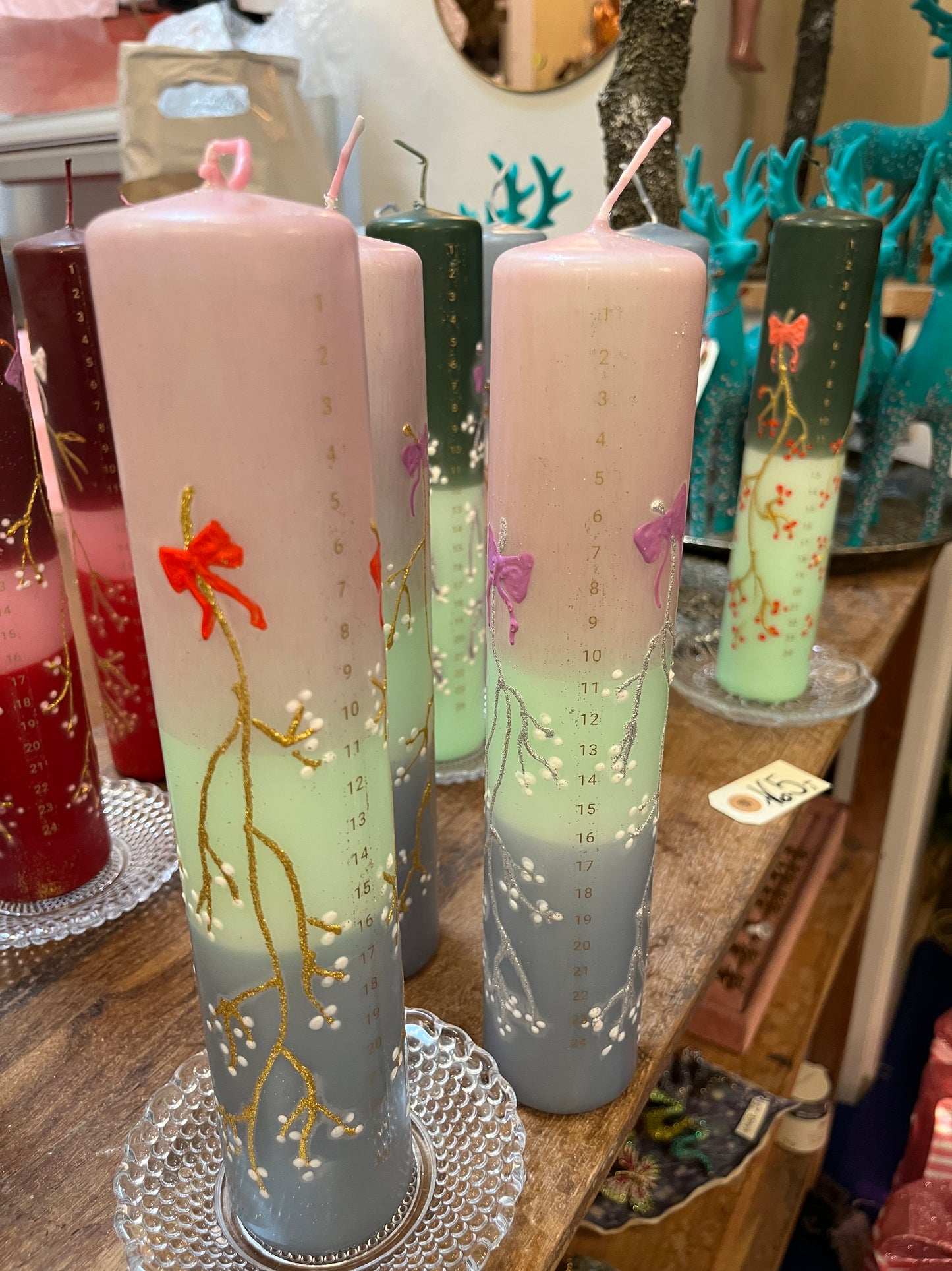 Kalenderlys i sart rosa, mint grøn og grågrøn