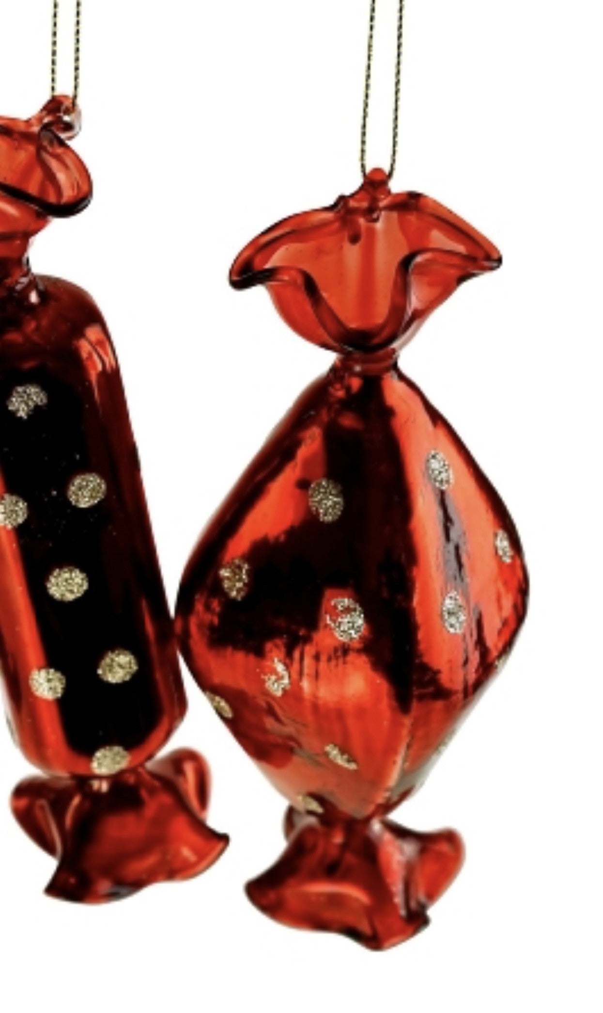 Røde glas bolsjer med prikker