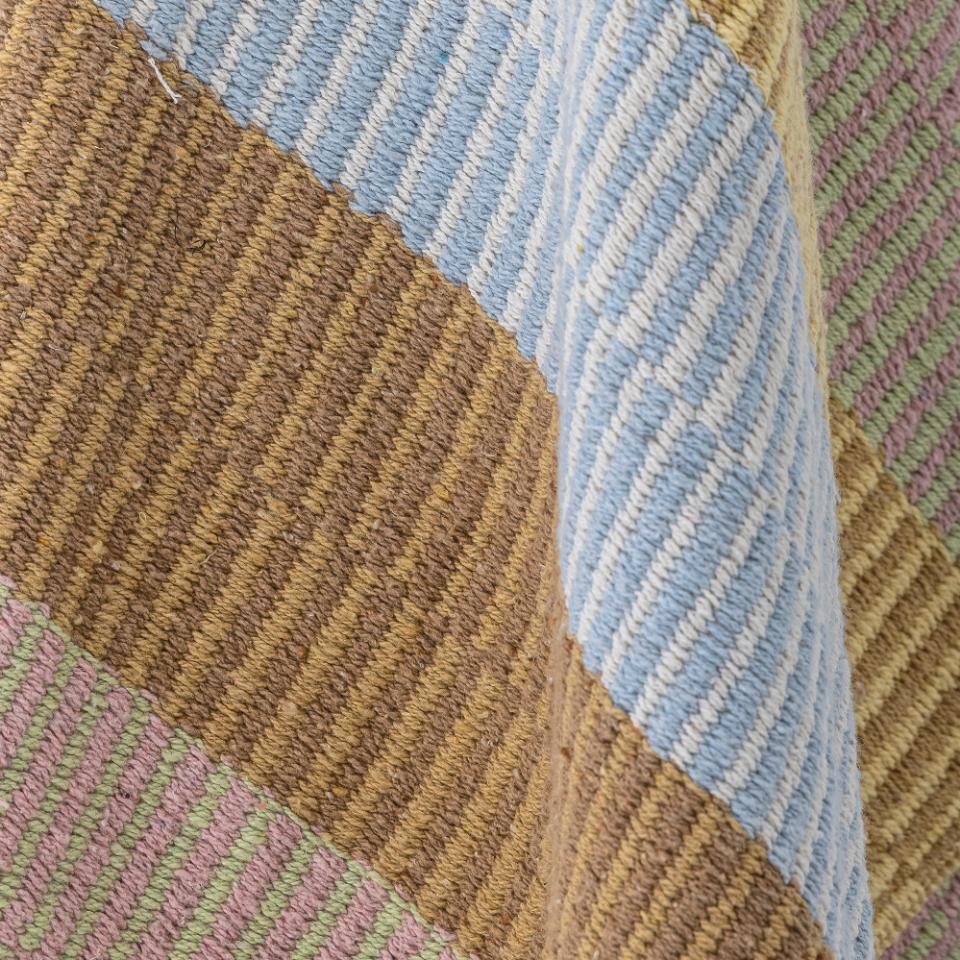 Plaid i lyseblå og brune toner