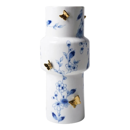 Cylindervase med små blå blomster med 3D guldsommerfugle