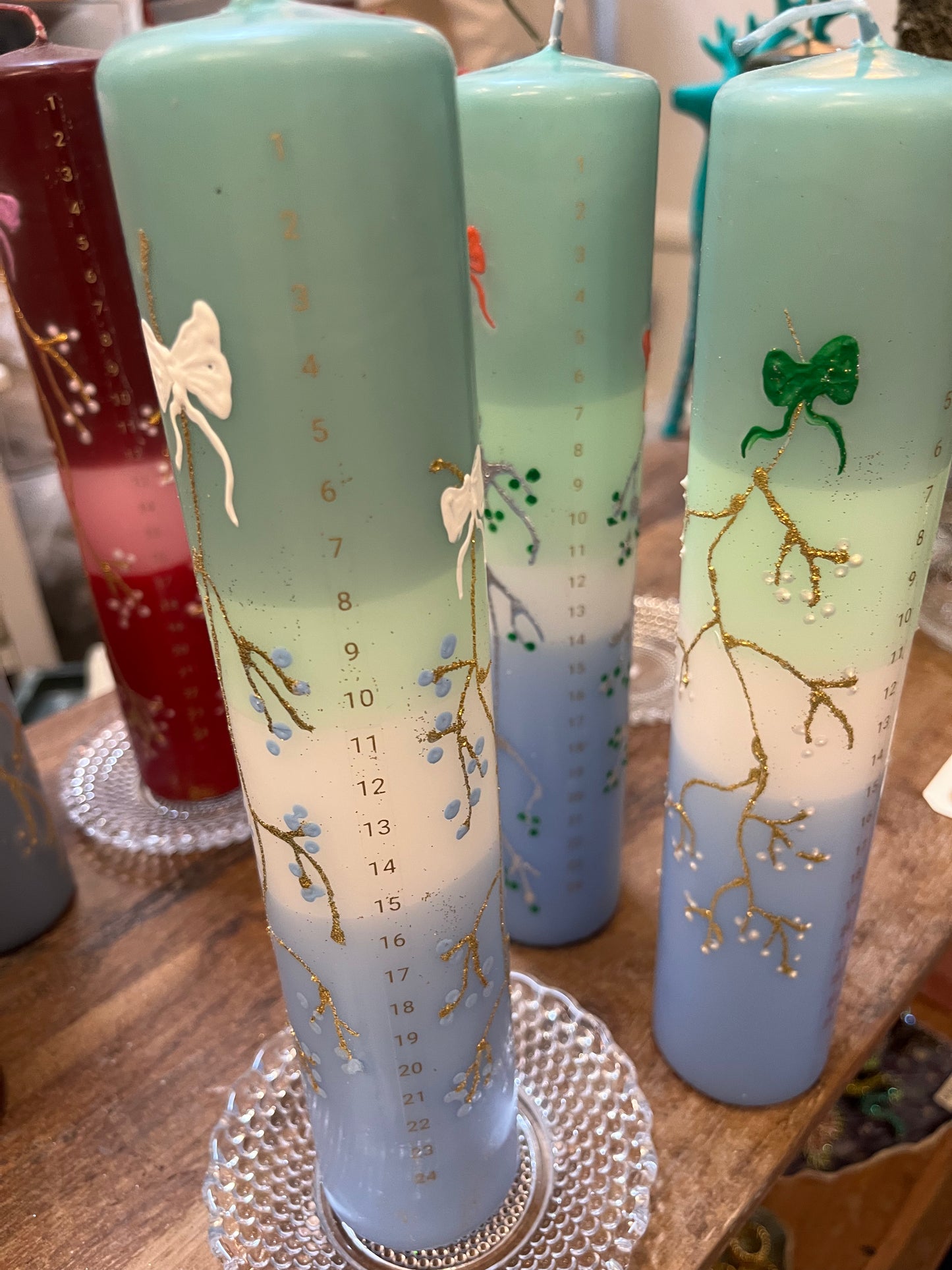 Kalenderlys støvet grøn, mintgrøn, hvid og lysblå