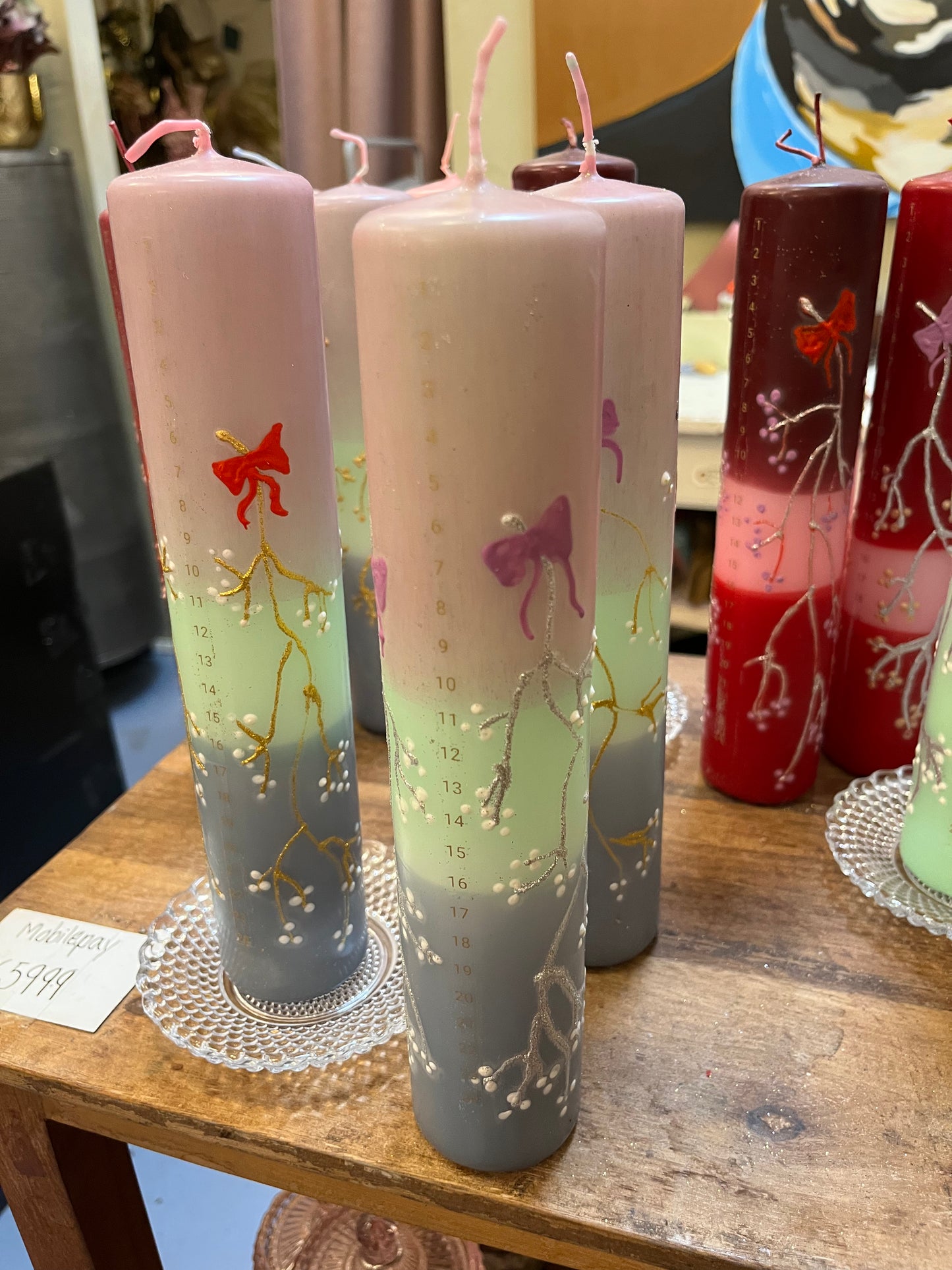 Kalenderlys i sart rosa, mint grøn og grågrøn