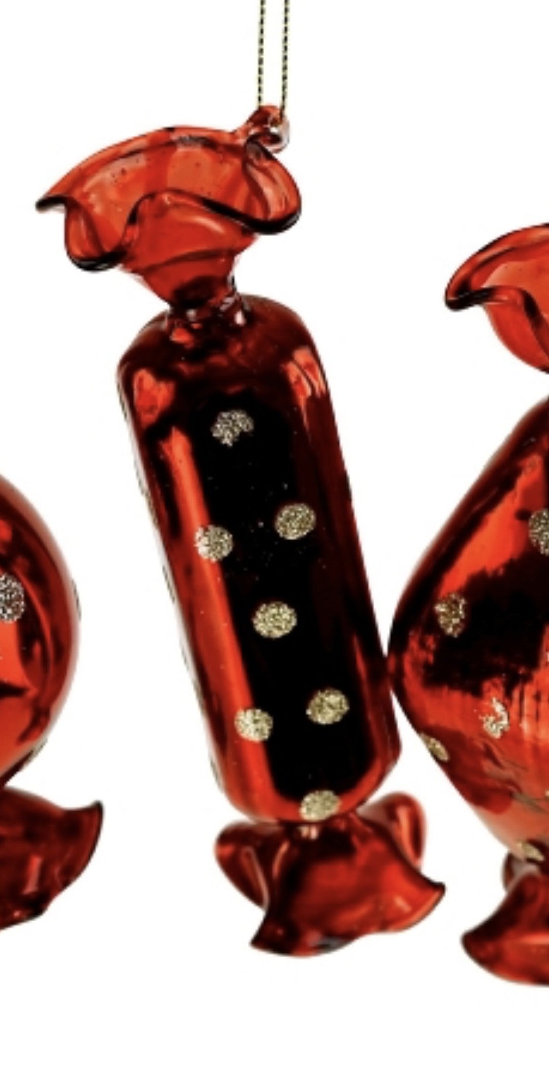 Røde glas bolsjer med prikker